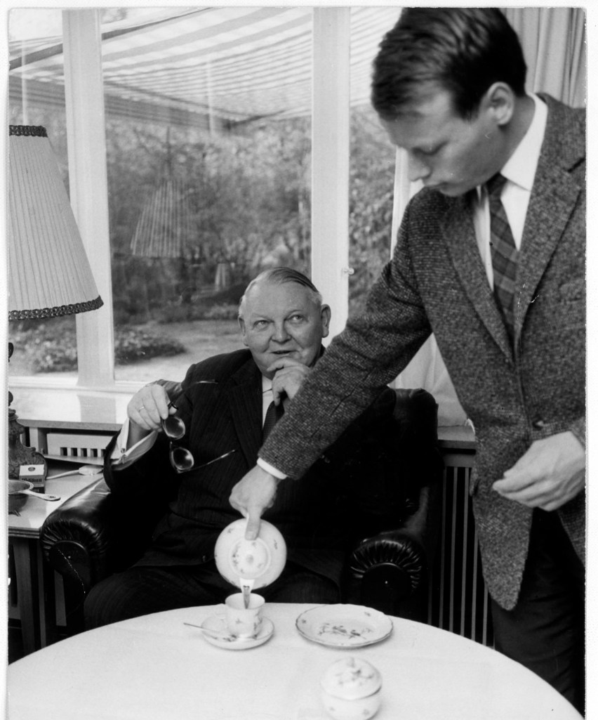 My dad pouring tea for his uncle, the chancellor, in the 60s